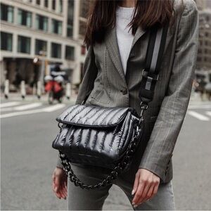THINK ROYLN Shiny Black Quilted Crossbody Bag